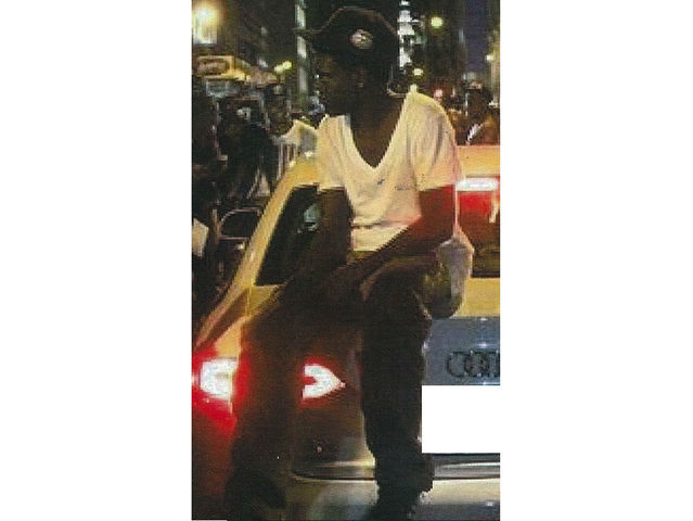 Police are searching for this man, wanted for jumping on a car during Fashion's Night Out in SoHo on Thursday, Sept. 6, and smashing its windows.