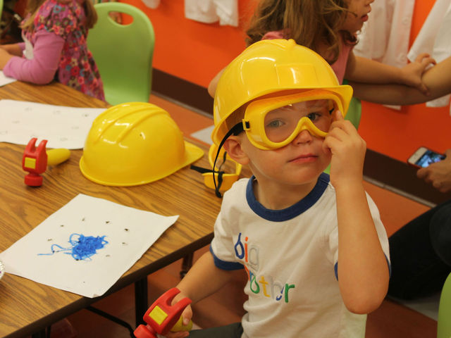 <p>Alex, 3, displays his new safety goggles in the Build It! Break It! Fix It! class at Apple Seeds.</p>
