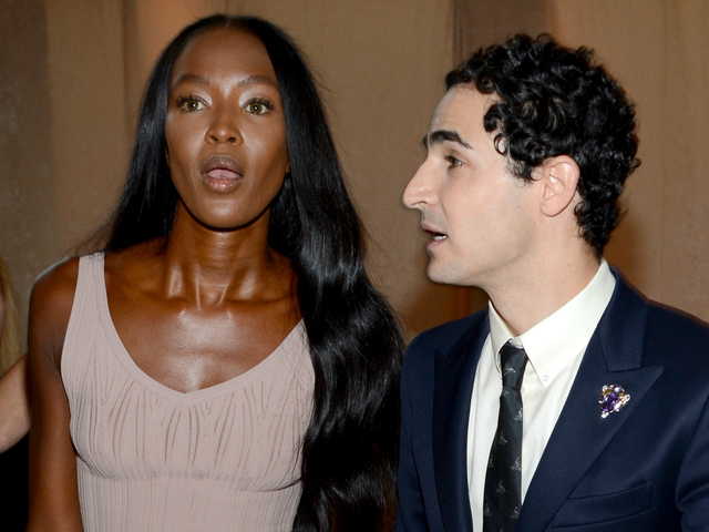 Naomi Campbell and designer Zac Posen prepare backstage at the Zac Posen Spring 2013 fashion show during Mercedes-Benz Fashion Week at Avery Fisher Hall at Lincoln Center on Sept. 9, 2012. An argument between three French fashionistas and PR executive Lynn Tesoro broke out at the show over seating.