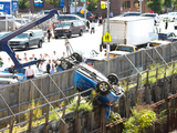 Out-of-Control Car Plunges 40 Feet Into Construction Site in Brooklyn