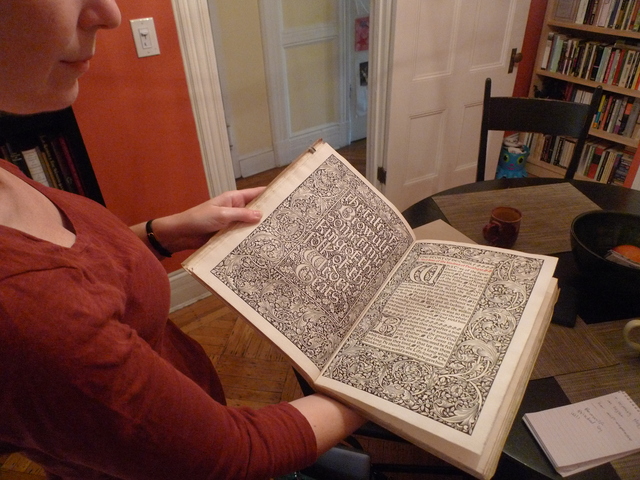 Heather O'Donnell of Honey & Wax Booksellers shows off a $8,2000 edition of 