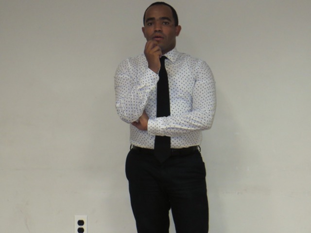 Council Member Robert Jackson staffer Juan Rosa, listens to concerns about Dyckman quality of life on Sept. 12, 2012.