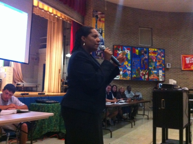 <p>Julissa Ferreras speaks during a rezoning meeting at I.S. 61.&nbsp;"Unfortunately, many of our children grow up in an overcrowded elementary school, and then go to an overcrowded junior high school, to then go to an overcrowded high school," Ferreras said at the meeting.</p>
