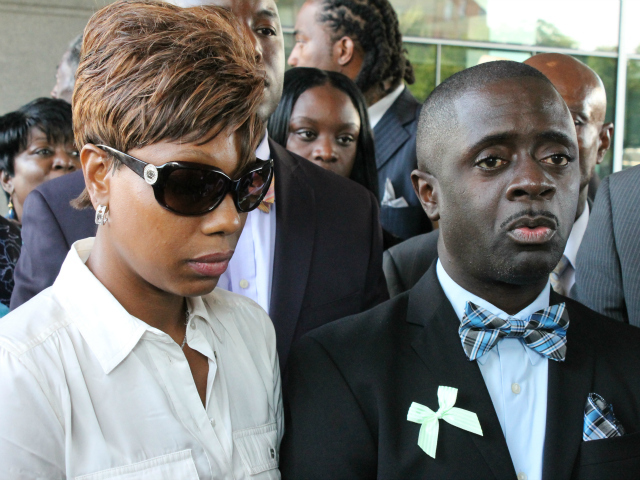 Franclot Graham, with his wife, Constance Malcolm, addressed reporters after Haste's hearing.
