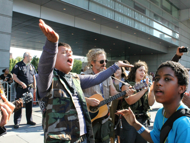 Members of the group Occupy Guitarmy performed outside the Bronx courthouse.