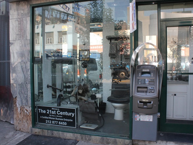 The Mac Felder Plumbing storefront features a full-sized bathroom.