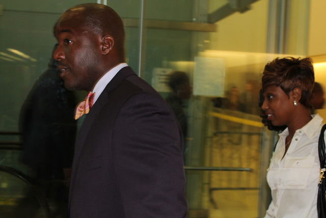Lawyer Royce Russell enters court with Ramarley graham's mother Constance Malcolm.