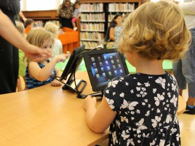 Parents say electronic gadgets like iPads and computers are distracting their children from books.