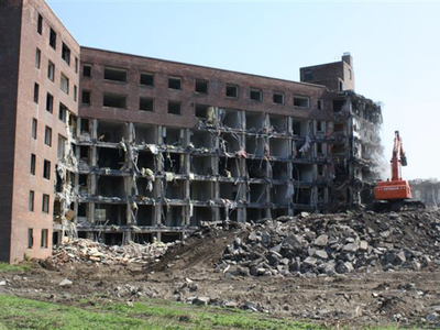 <p>Demolition of a seven story high rise began Thursday, Sept. 13, 2012. It is the first of four buildings that will be demolished over the next several months.</p>
