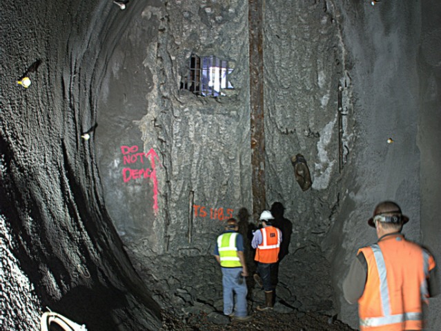 Workers in the new tunnel the MTA is building between Queens and Manhattan as part of the East Side Access project Sept. 20, 2012. 