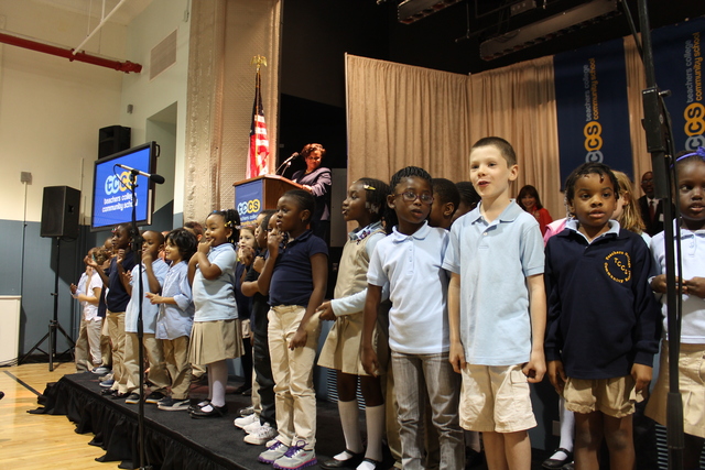 First-graders at Teachers College Community School perform during a welcoming ceremony.