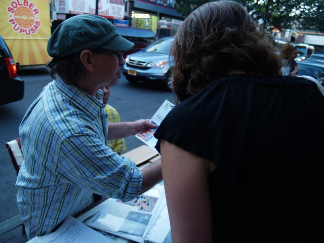 Clothing and art vendors were organized outside the Jackson Heights Cinema by Design For You.