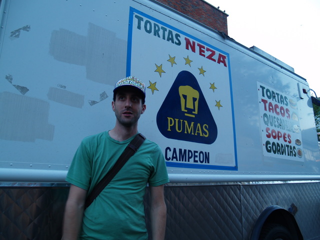 Food blogger Jeffrey Orlick, posing in front of the Tortas Nezas truck, picked all of the food vendors at the Viva La Comida! festival.