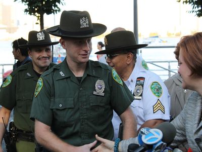 <p>Park Officer Daniel Murphy with City Council Speaker Christine Quinn at a rally to protest the rape of a woman there Saturday, Sept. 22, 2012.</p>
