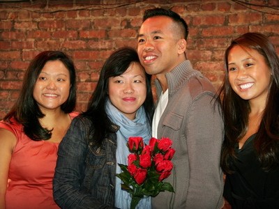 Daniel Chan and Jenn Chen pose with family and friends after their engagement. 