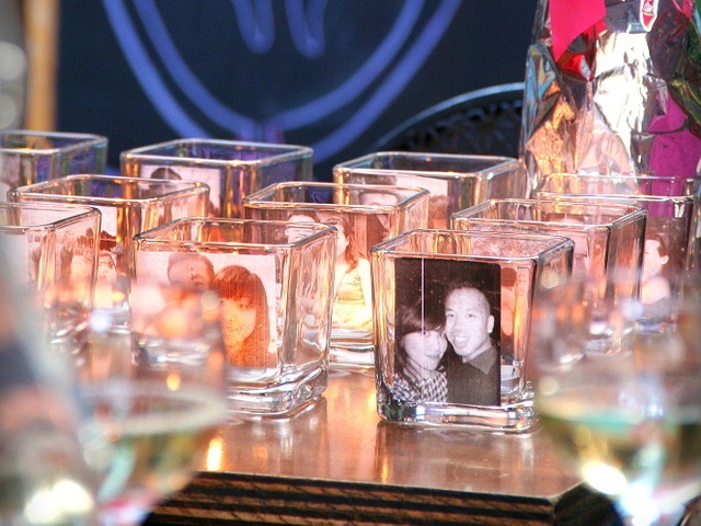 Daniel Chan decorated the Mudspot Cafe on East 9th Street with images of him and his now-fiancee in front of candles. 