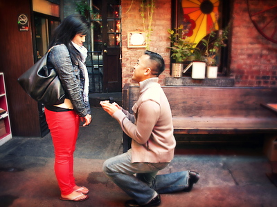 Daniel Chan gets down on his knee to ask Jenn Chen to marry him. 