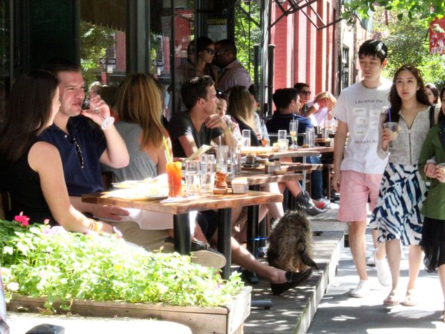 The outside deck at Extra Virgin on West 4th Street provides a platform for people watching. 