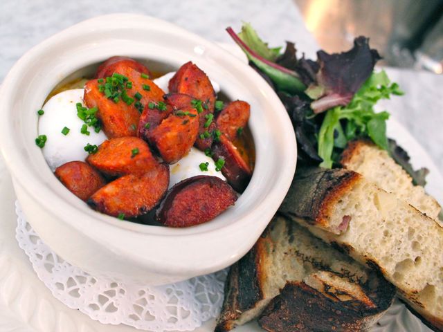 <p>Tipsy Parsons hangs its menu on hearty meals such as Pig in a Poke with grits, andouille sausage and poached eggs with a side of poached eggs and toast.</p>
