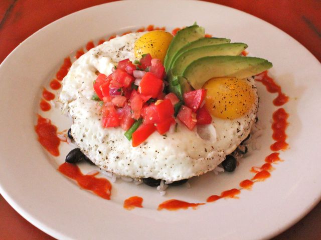 <p>Huevos Rancheros is a signature dish on the casual menu at Mudspot Cafe.</p>

