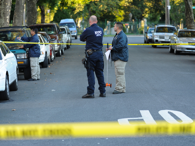 Police at the scene of a fatal shooting in Brooklyn on Tuesday September 25th, 2012.