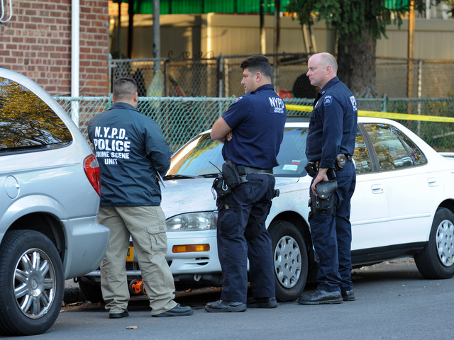 Police at the scene of a fatal shooting in Brooklyn on Tuesday September 25th, 2012.