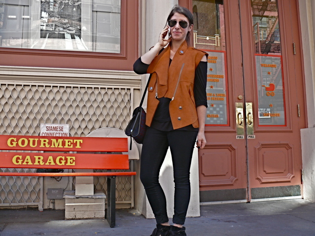 Sean S. in suede vest with asymmetric collar and motorcycle details
