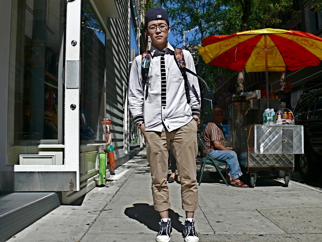 Kenji in  hip black and white shirt details in SoHo