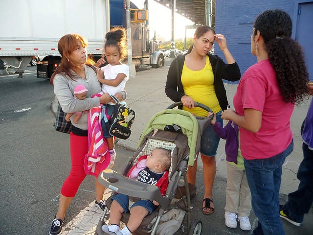 G.I.V.E. founder Nilka Martell stopped those passing on the street talk to them about local park projects. Many, she said, are unaware that there are open spaces right in their own neighborhoods. 