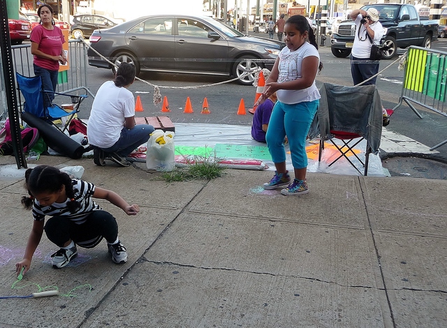 Members of the Parkchester-based neighborhood improvement group G.I.V.E participated in Park(ing) Day on Friday, an international event where residents convert parking spots into temporary public parks.