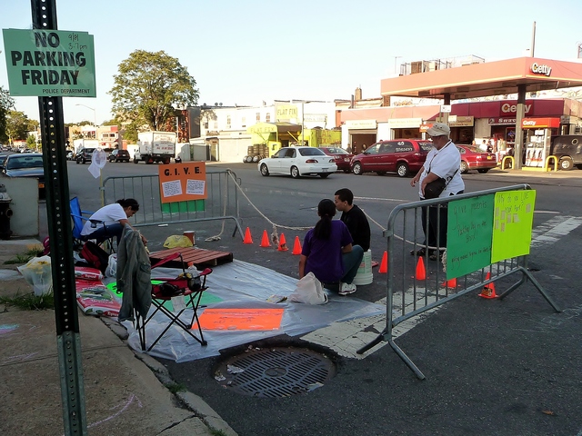 The group set up their space at the corner of Bronx River Avenue and Westchester Avenue, laying a plastic tarp on the ground between cones and parking barriers.