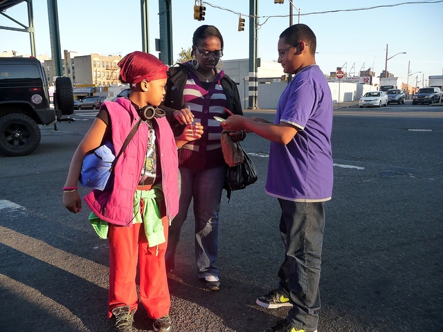 The group was hoping to raise awareness about the Bronx's many riverfront parks and their resources. G.I.V.E. member Isaias Vega asks those passing by to wrote down the reasons they love their community parks. 