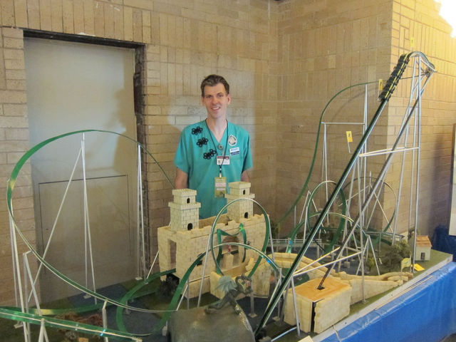 Randal Strong-Wallace shows off his roller coaster model at Maker Faire.