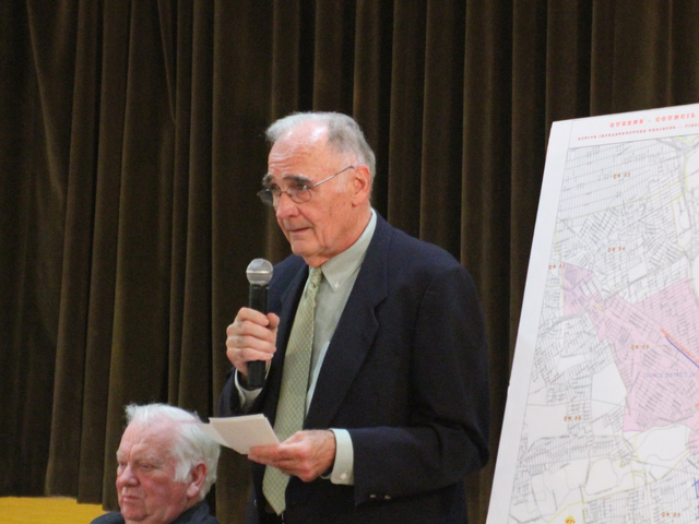 DEP spokesperson Edward Coleman explains the causes of flooding to residents at a Town Hall at the Forest Hills Jewish Center of Sept. 27, 2012.