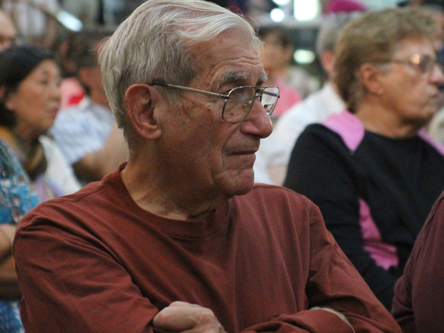 A man listens in during a Town Hall at the Forest Hills Jewish Center of Sept. 27, 2012.