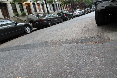 <p>Hamilton Terrace residents say speeding cars run right over the worn speed bump.</p>
