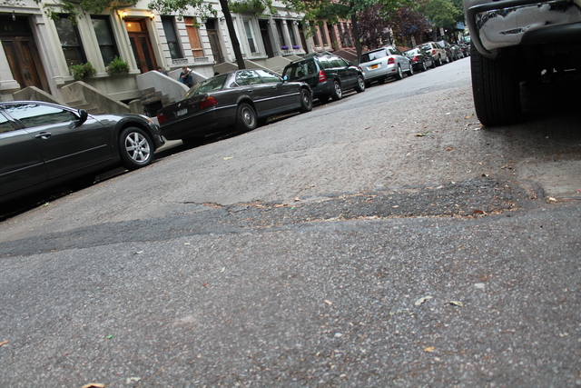 <p>Hamilton Terrace residents say speeding cars run right over the worn speed bump.</p>
