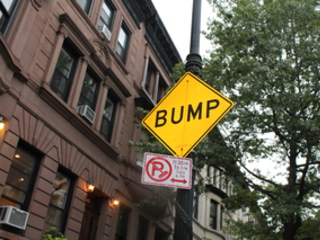 "There used to be two speed bumps," said Marvin Terry, 62, a wood worker who has lived on the street since 1995. "The bump's that left is too low."