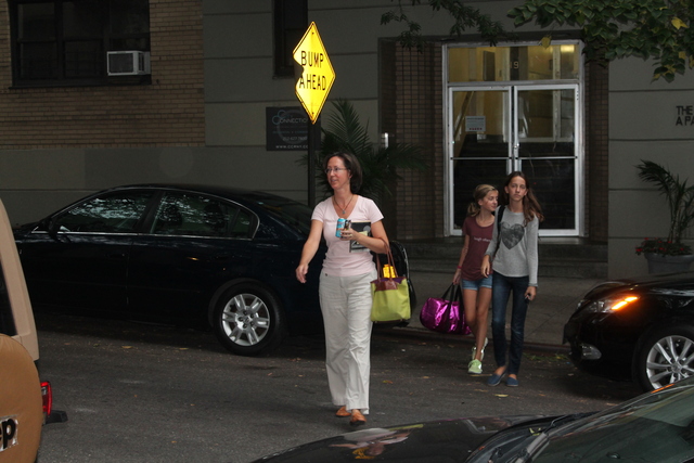 <p>Jennifer Geddes, 45, crosses the street with daughters Isabel, 14 and Fiona, 11. "The minute they turn the corner, they fly up the hill, especially during rush hour," said Jennifer Geddes.</p>
