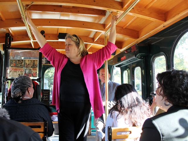 <p>Woodlawn historian Susan Olsen leads a tour of the grounds on the Bronx Culture Trolley, pointing out the gravesites of historic women who are laid to rest at the cemetery.</p>
