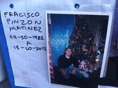 <p>A shrine is put out for Francisco Pinzon-Martinez, 30, at a Metro PCS store in Hamilton Heights on October 19, 2012.</p>
