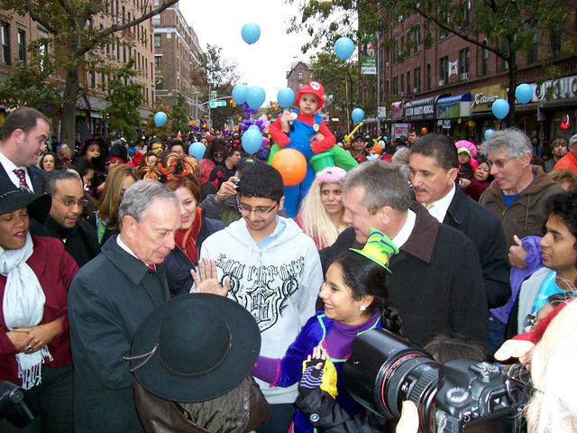 <p>A mini-Mario Brother looks on as Mayor Bloomberg and local politicians greet parade-goers at the&nbsp;Jackson Heights Halloween Parade.</p>
