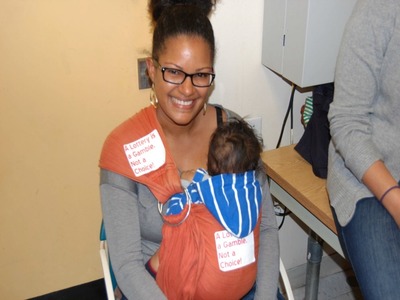 <p>Lizzi Sofge, a mother of two, said she was appalled by the plan to get rid of elementary school zones in upper Manhattan. She spoke at a District 6 Community Education Council meeting Oct. 18, 2012.</p>
