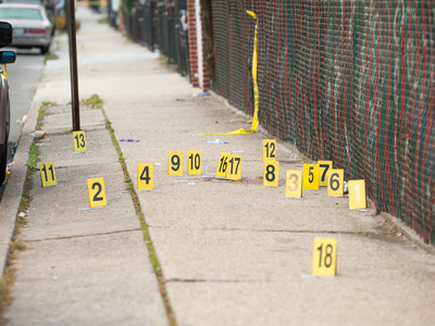 <p>Evidence markers dot the shooting scene on Hemlock Street and Blake Avenue in Brooklyn on Oct. 22, 2012. .</p>
