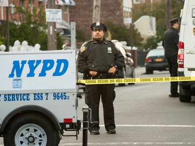<p>Police at the scene of a fatal shooting on Hemlock Street in Brooklyn. Photo taken on Tuesday October 23rd, 2012.</p>
