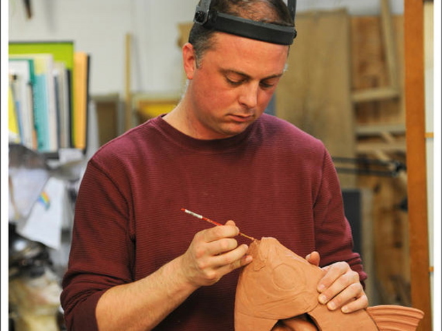 <p>A museum artist works on a ponyfish model at the American Museum of Natural History, an interactive mix of science and art that Susan Anderson said a North Brooklyn museum would aspire to implement.</p>
