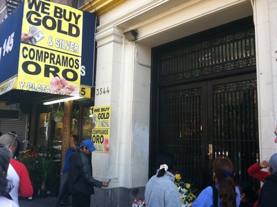 <p>The Metro PCS store where Francisco Pinzon-Martinez, 30, an employee, was found dead, on Broadway near West 145th Street.</p>
