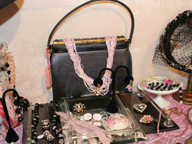 The store takes great care in arranging jewelry and accessories according to color theme.