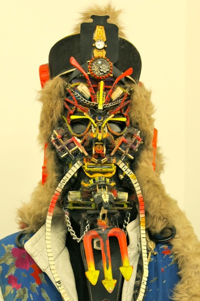 <p>The artist Rammellzee often wore the multicolored, multimedia masks he made.</p>
