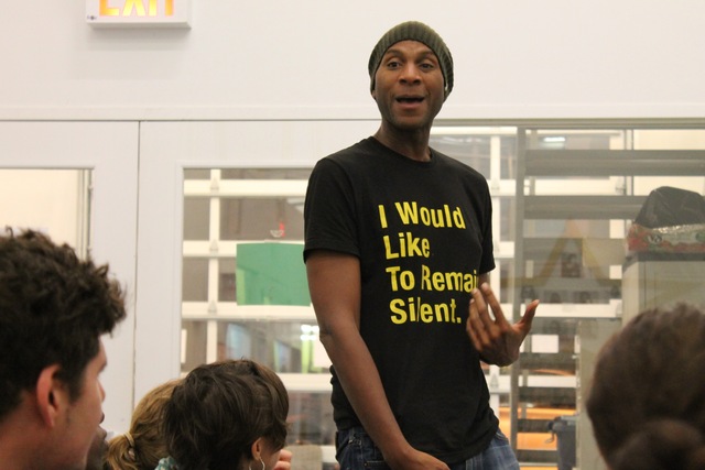 <p>Reg Flowers, seen here speaking at a community meeting in Red Hook Oct. 15, 2012, is founder and artistic director Falconworks Artists Group.</p>
<p>&nbsp;</p>
<p>Community activist Reg Flowers, a Community Change Worker at Red Hook Initiative and an organizer with Occupy Red Hook, shows off a T-shirt protesting NYPD stop-and-frisk tactics at the Red Hook Initiative Center Monday night, Oct. 15, 2012</p>
